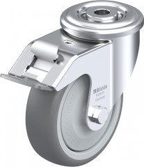 Roulette pivotante caoutchouc thermoplastique avec trou central et blocage « stop-fix »